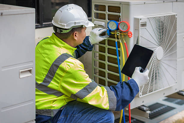Professional Heat Pump Repair technician working in Derby, NY